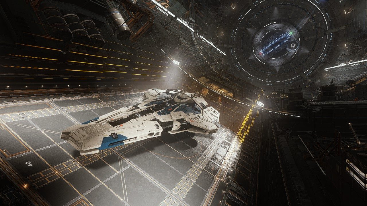Well-framed ship in hangar, strong detail and lighting.
