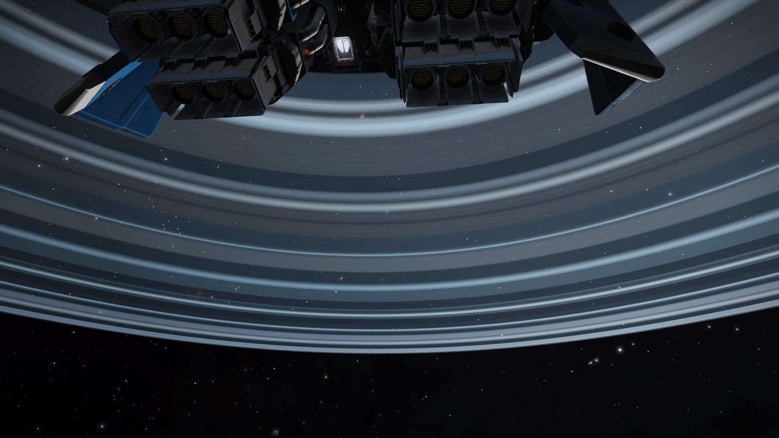 Good composition with ship and rings, strong ambient space visuals.