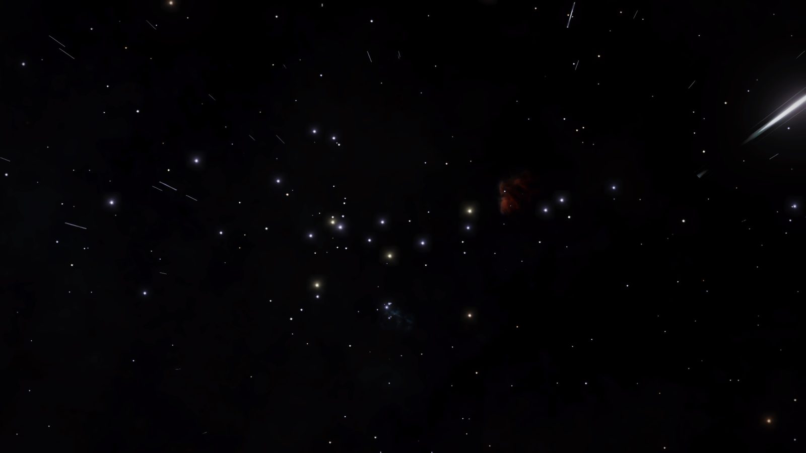 Wide starfield with nebula and shooting star, atmospheric space scene.