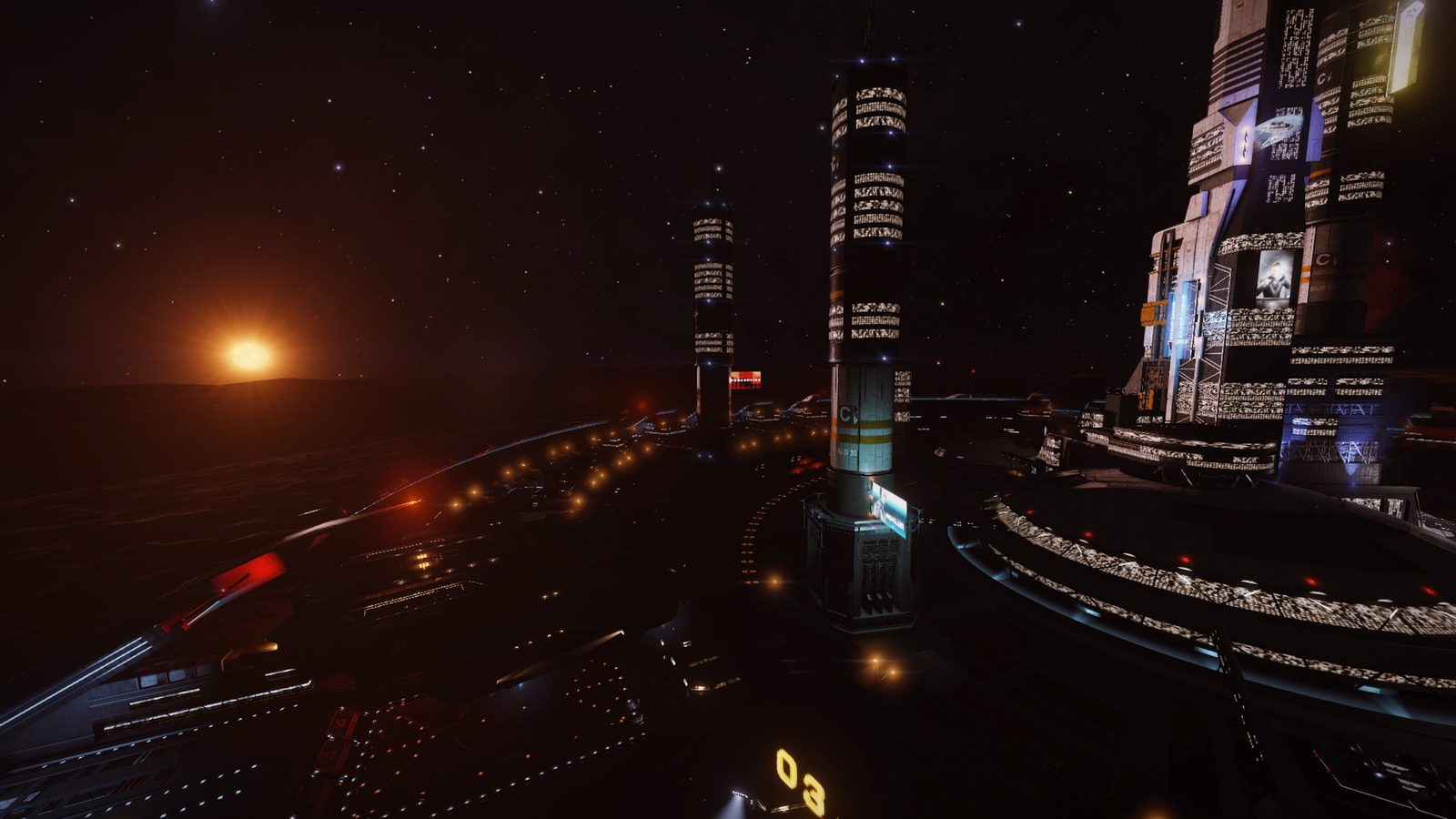 Night station view with good lighting and scale.
