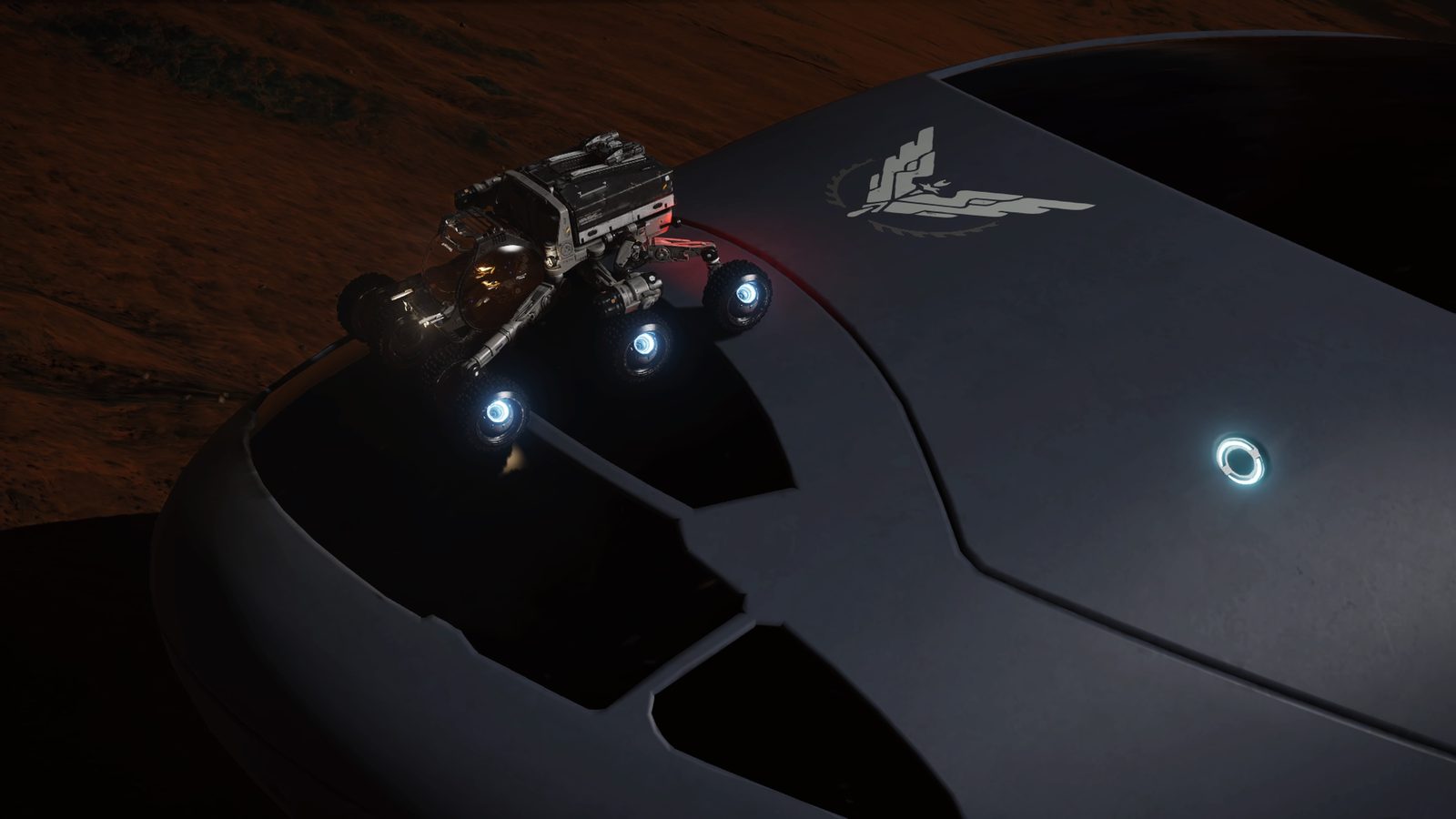 Well-lit close-up of ship with rover, good detail and scale contrast.