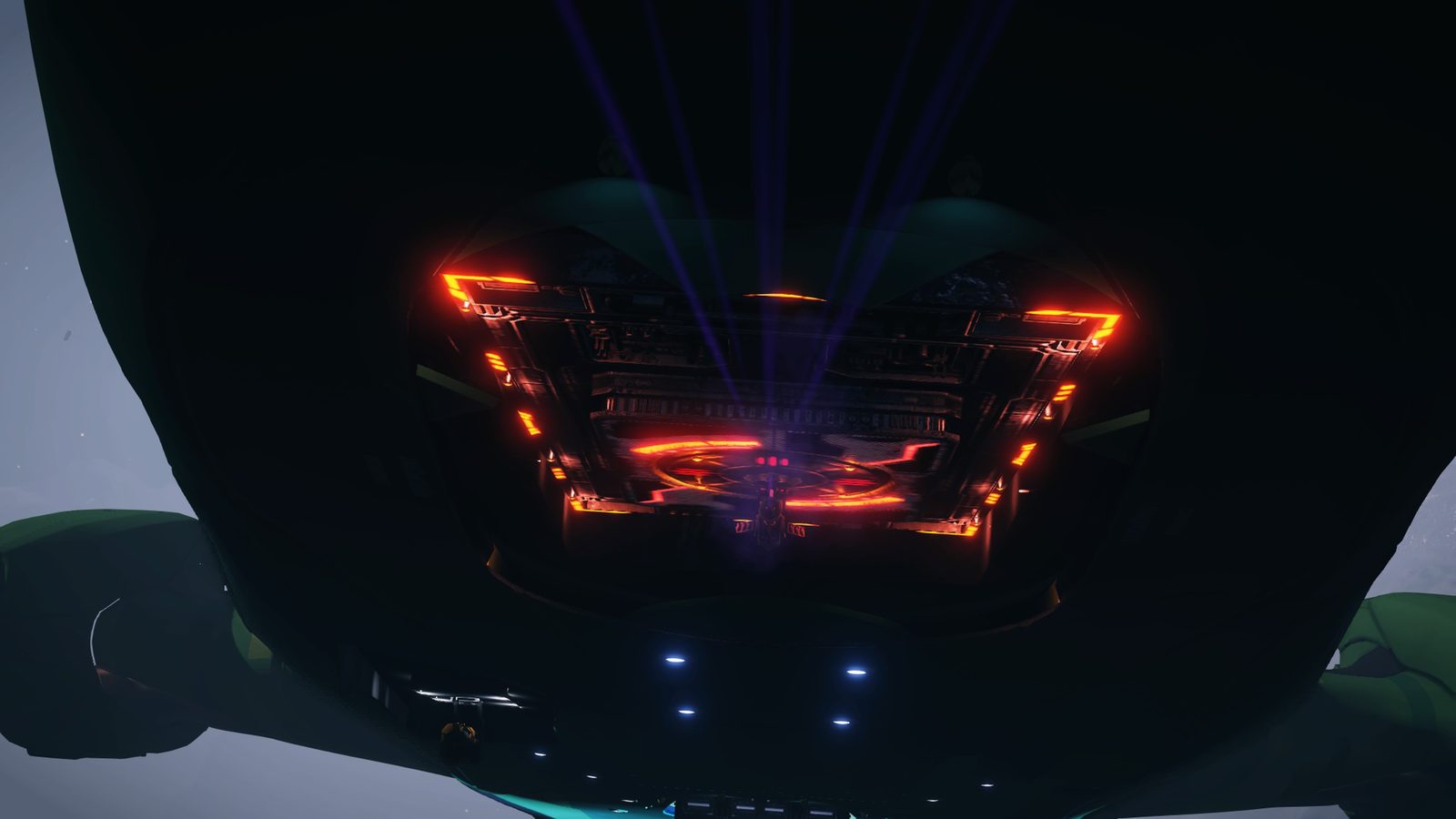 Ship rear with illuminated thrusters and beams in dark space.