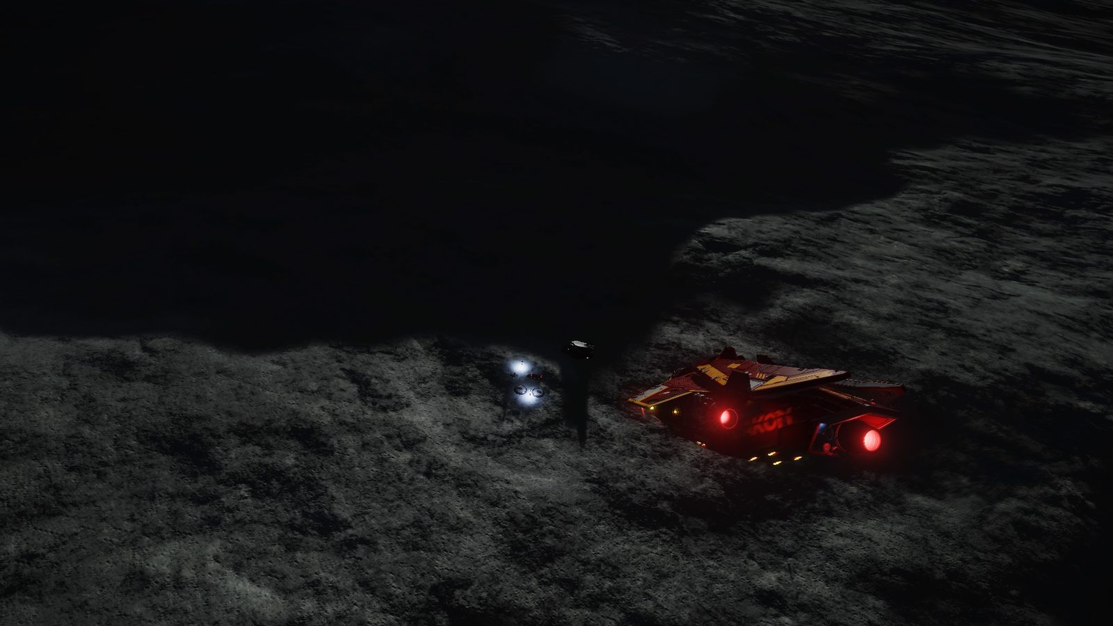 Dark planetary surface with illuminated ship and lights.