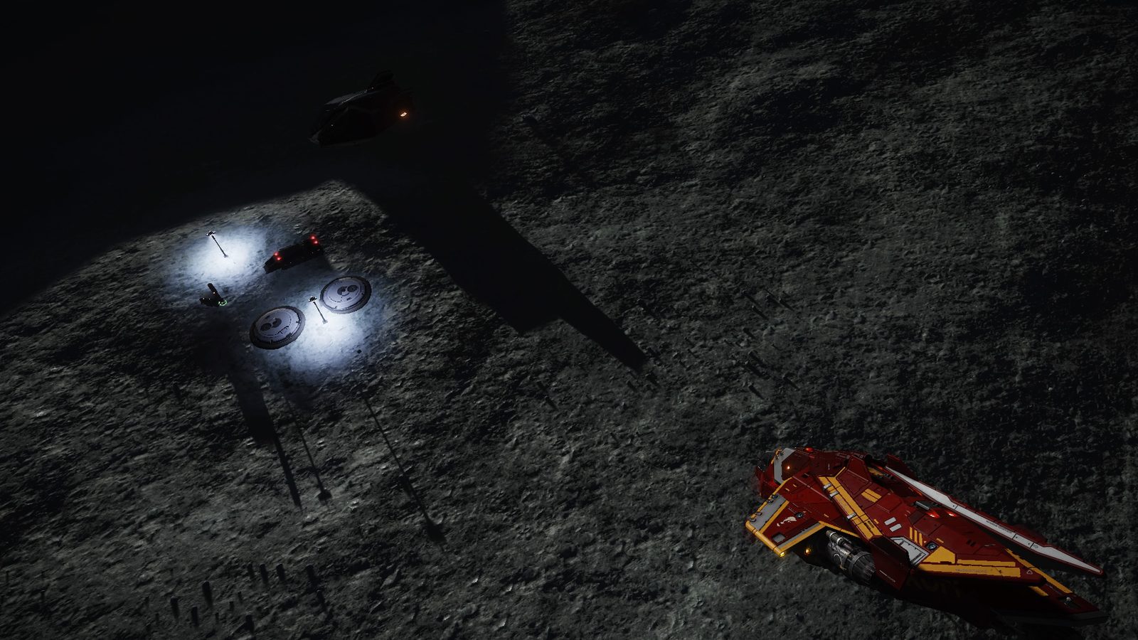 Ship on surface with bright lights and shadows.