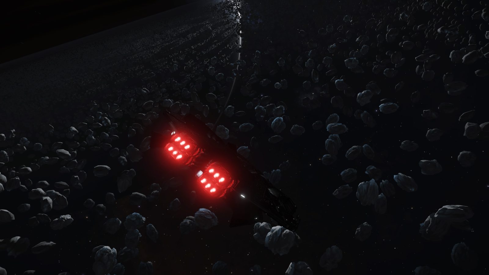 Dark asteroid field with illuminated ship thrusters, good composition and scale.