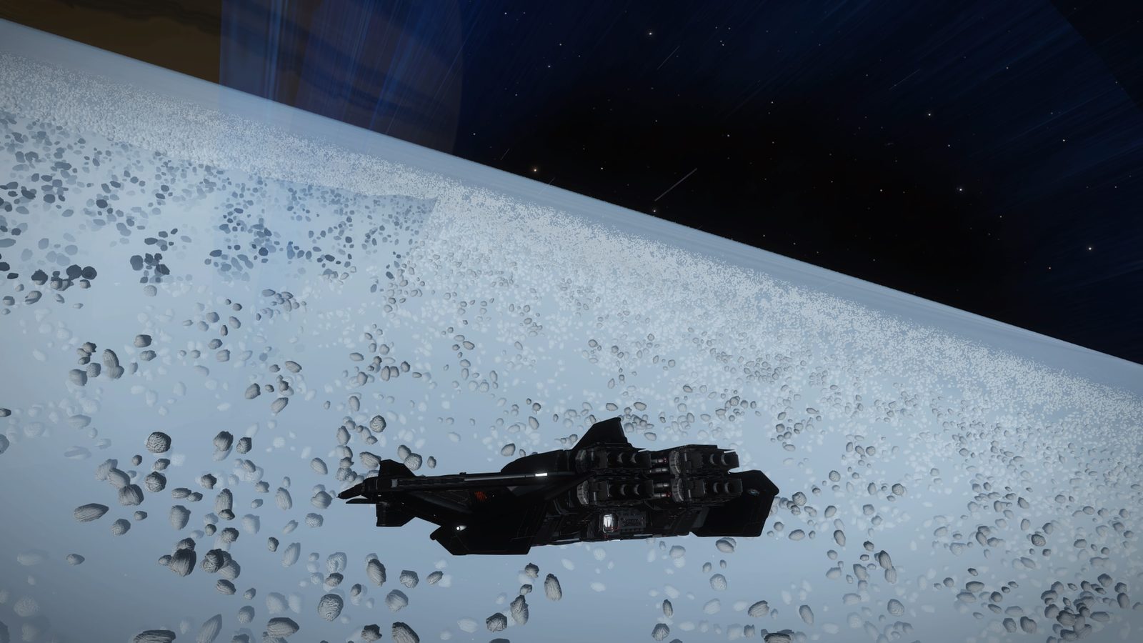 Ship near icy rings with strong environmental context.
