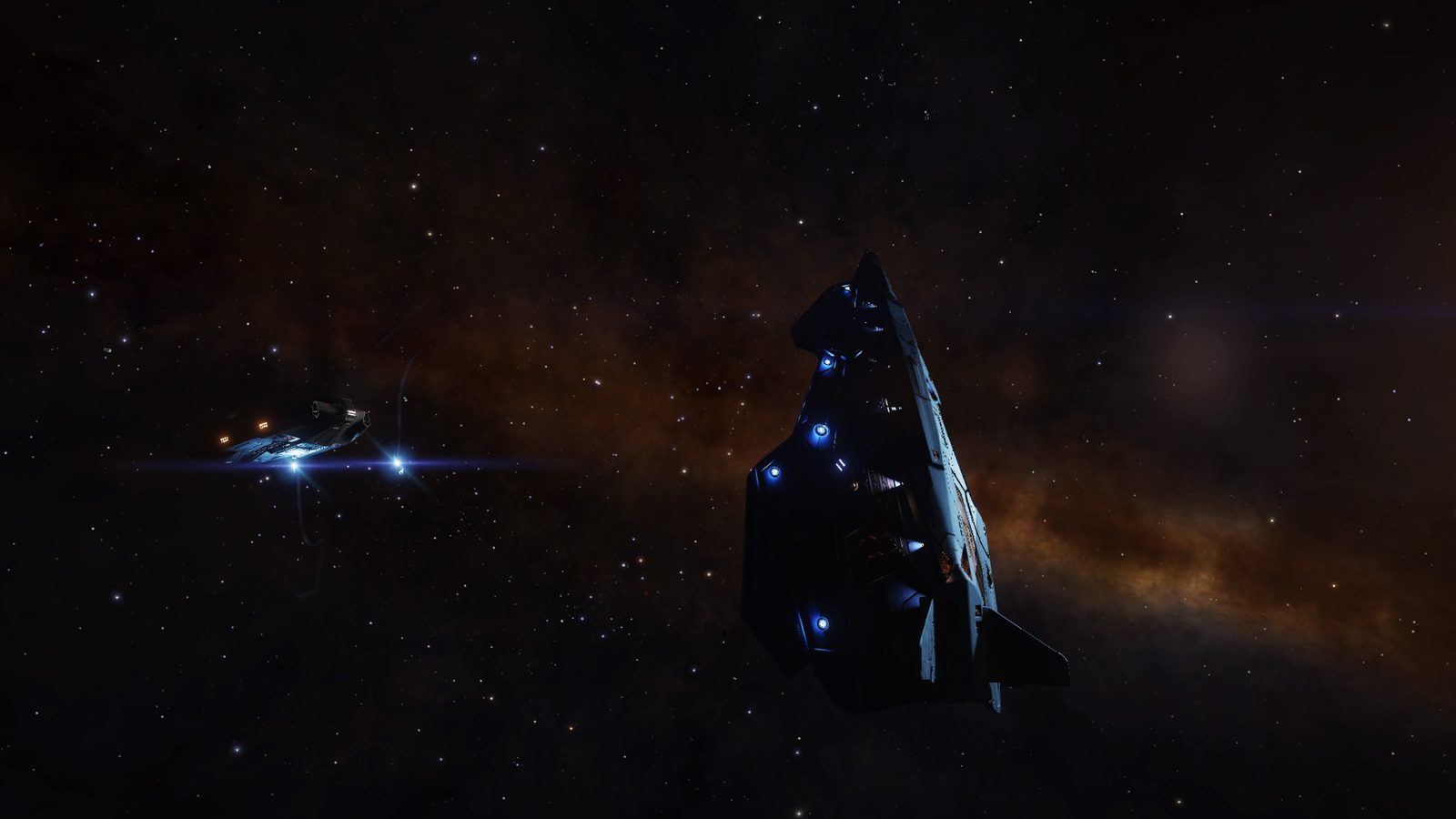 Two ships facing each other in space with colorful background, balanced frame
