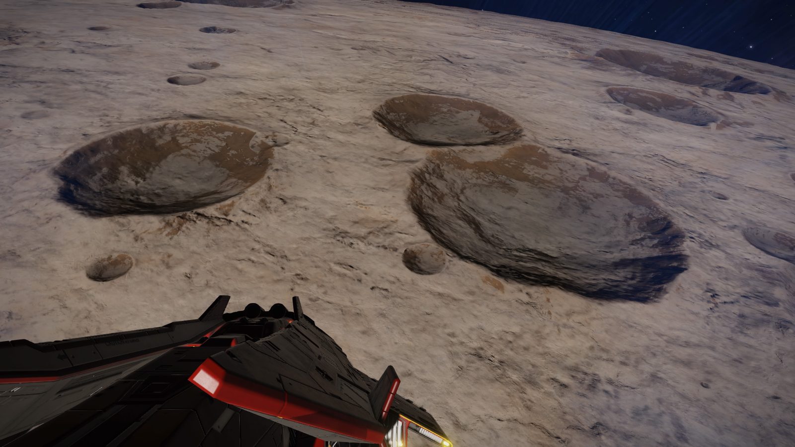 Close planetary surface with craters and ship foreground.
