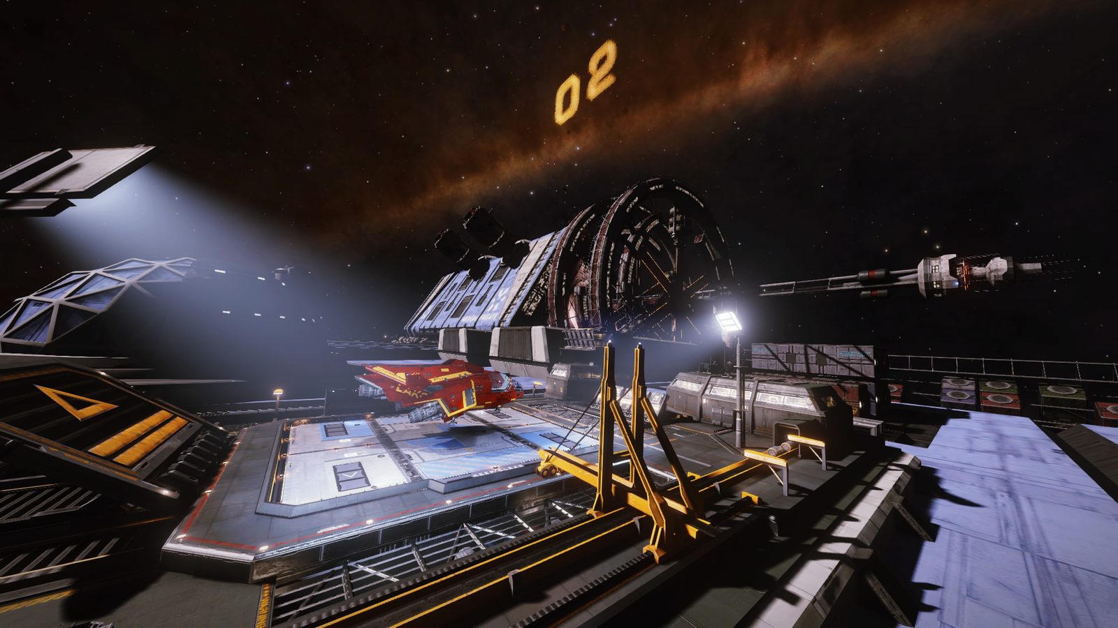 Ship docked or landed on a station platform under bright lights.