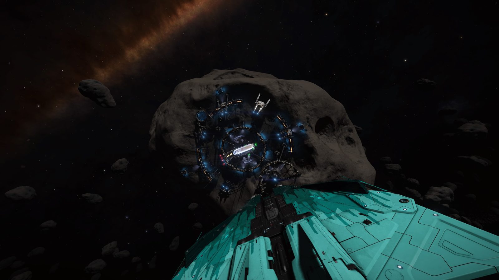 Ship near asteroid station with detailed structures.