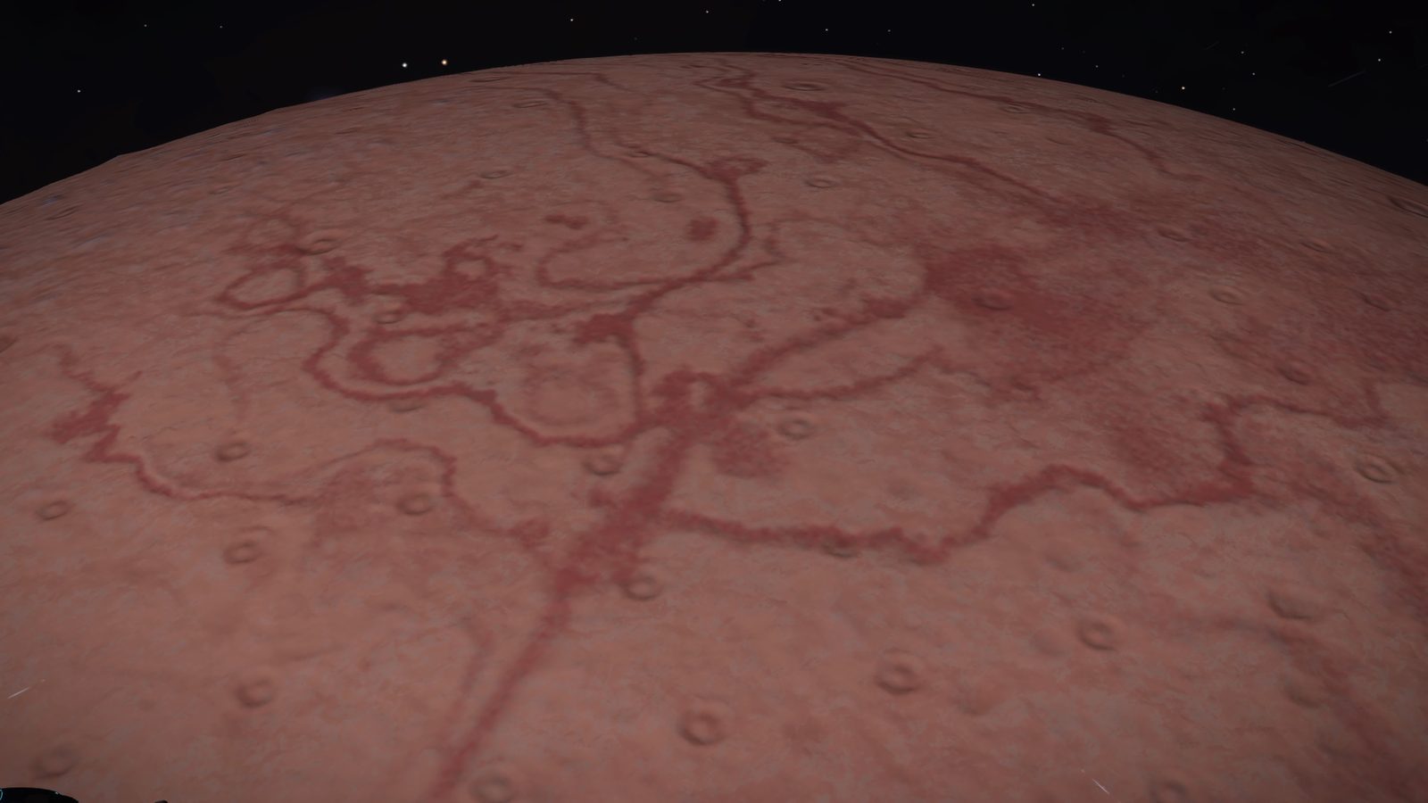 Planet surface close-up showing terrain features.